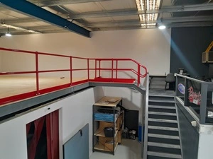 A picture of a mezzanine in Adelaide with connecting catwalk and stairs.